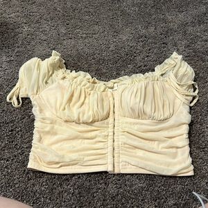 Cream off shoulder top